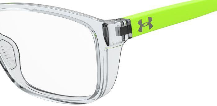 Kids' prescription glasses (close up of temple). The rectangular frame is transparent with fluorescent green arms. The grey Under Armour logo is located on the temple.