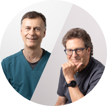 Headshots of doctors Paul Gray and Dave Dobbelsteyn wearing scrubs, smiling.