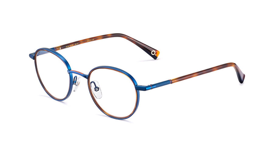 Men’s prescription eyewear: A side view of a round, blue metal frame with Havana temples. The Etnia insignia located on the inside of the temple tips.