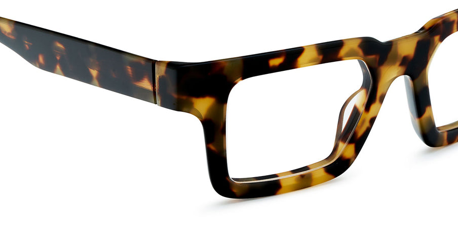 Unisex prescription eyewear: A close-up of a bold tortoise square frame made of acetate. 