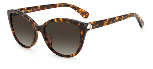 Women's sunglasses: A Havana brown plastic frame in a subtle cat eye shape. The lenses are brown gradient and the bold metallic Spade insignia is located on the temples, close to the hinges.