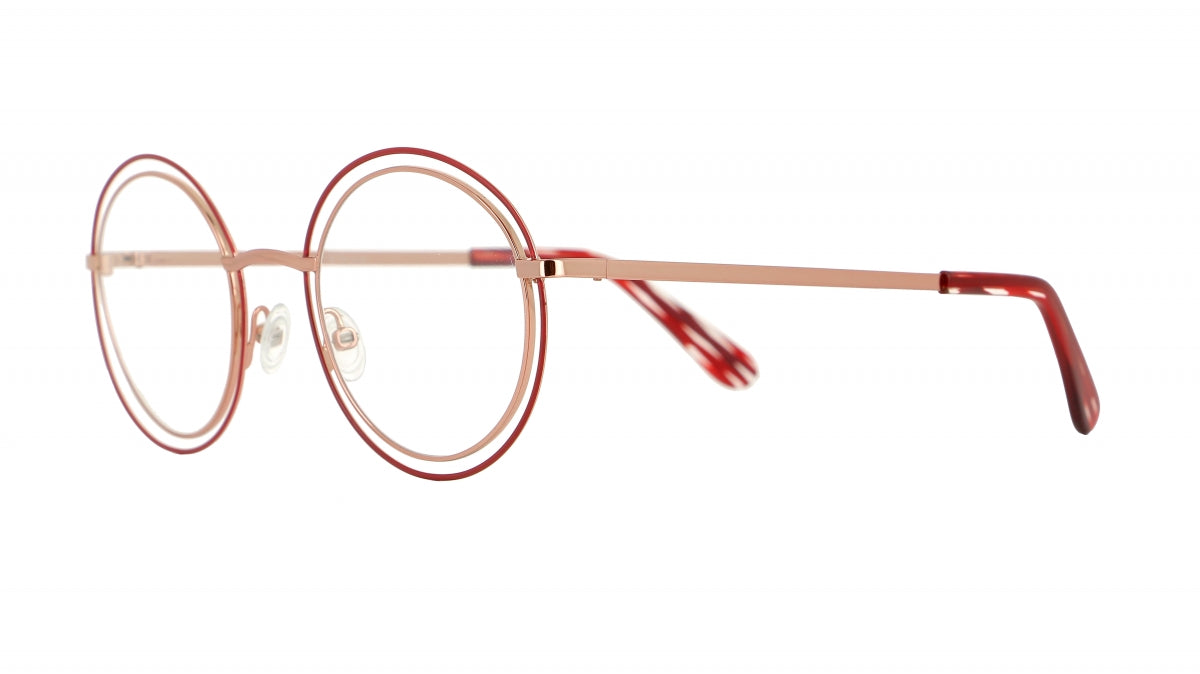 Women's prescription eyewear – A side view of a round metal frame, in a burgundy and rose gold colours.