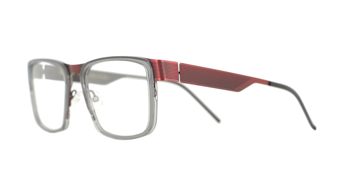 Men's prescription eyewear – A partial side view of a rectangular metal frame that is matt burgundy and grey.