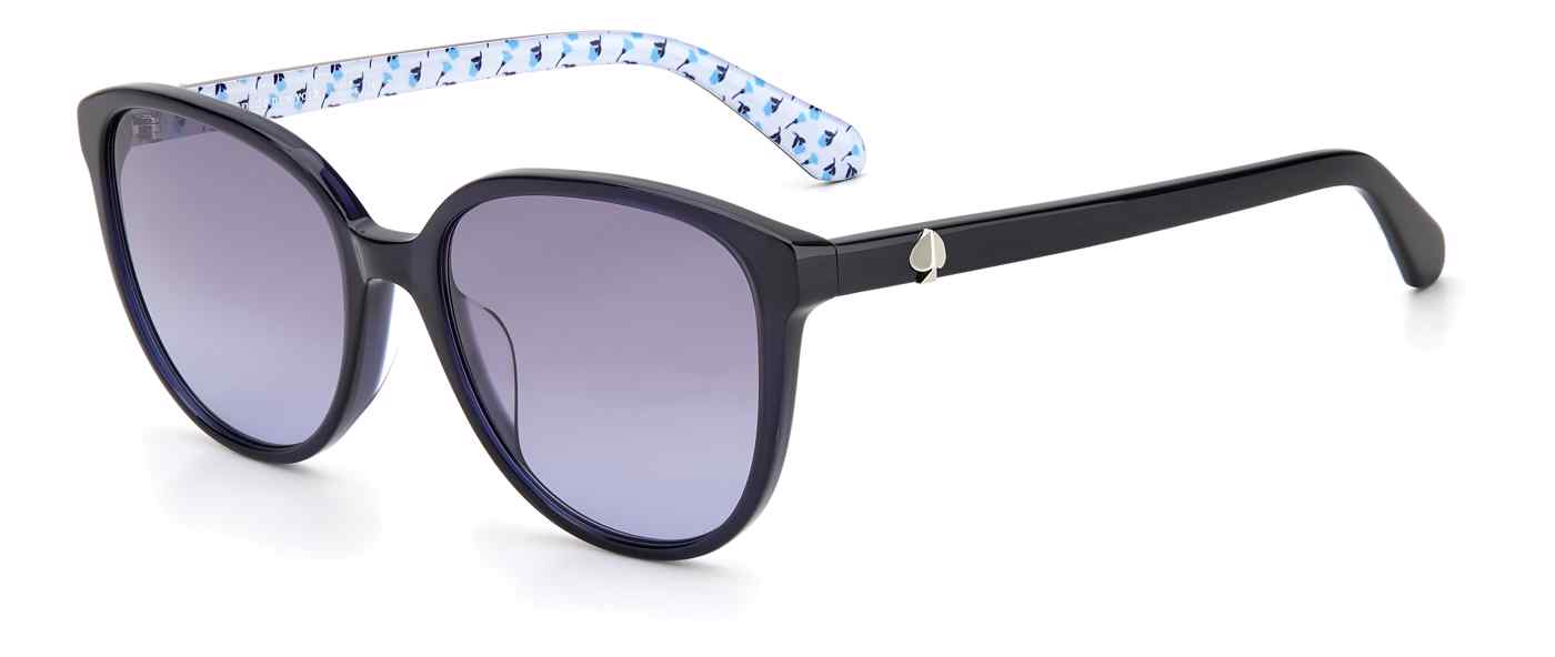 Women's sunglasses: A dark blue acetate frame with a subtle cat eye design. The interior of the temples has geometric trimming in white, light and dark blue. The lenses are gradient grey and the metallic Spade insignia is located on the temples.