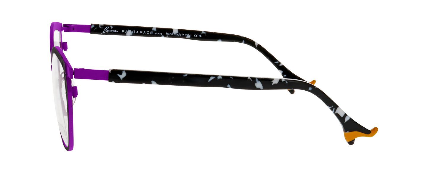 Women's prescription eyewear – A side view of an oval titanium frame that is black and purple in colour.  The black and white speckled temples are finished with orange ladies’ shoe tips
